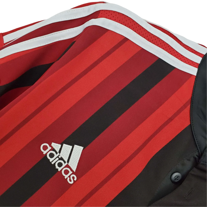 https://cdn.shopify.com/s/files/1/0826/7228/8075/files/20142015-ac-milan-fly-emirates-home-retro-kit-692864.webp?v=1741197276