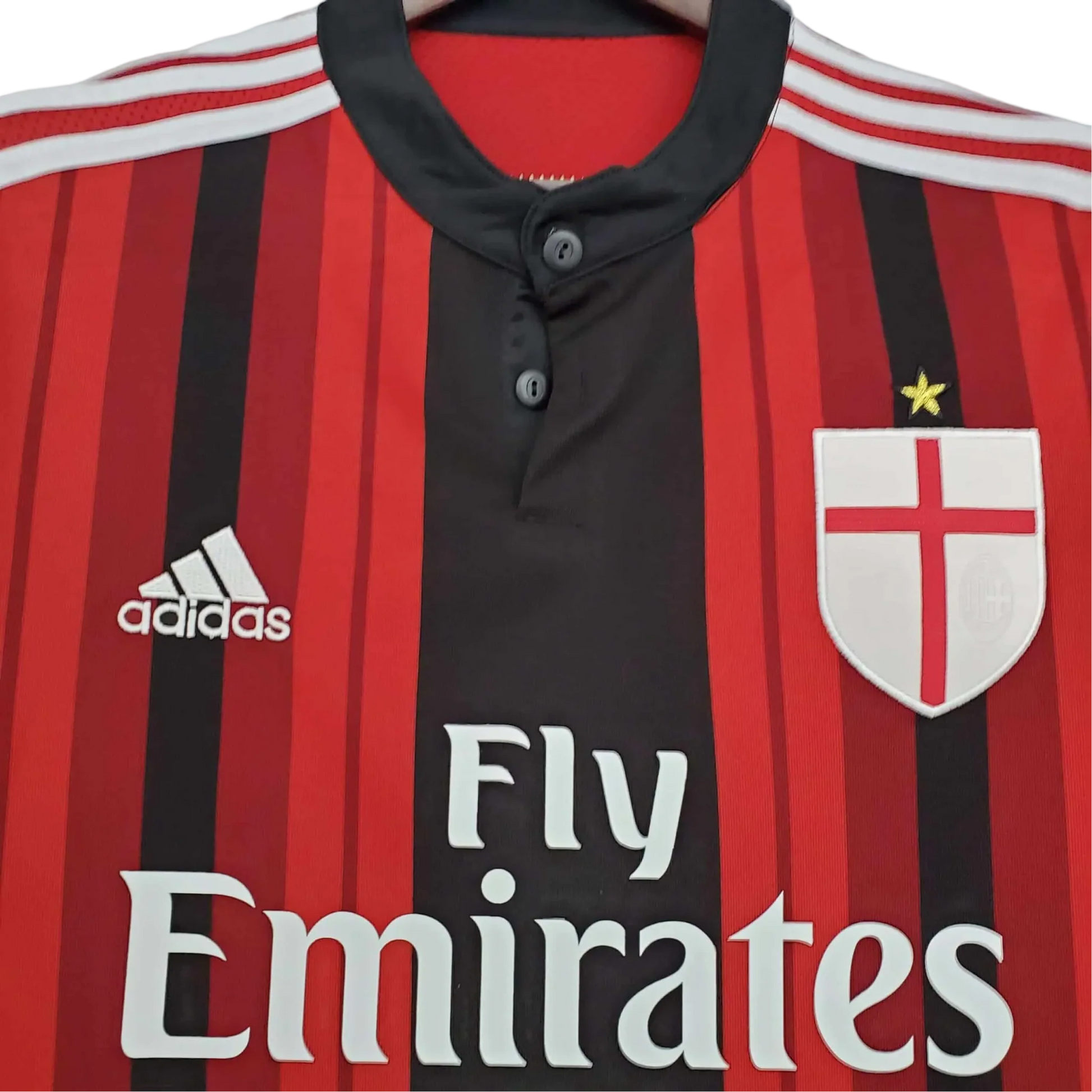 https://cdn.shopify.com/s/files/1/0826/7228/8075/files/20142015-ac-milan-fly-emirates-home-retro-kit-727283.webp?v=1741197277