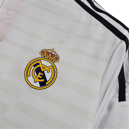 https://cdn.shopify.com/s/files/1/0826/7228/8075/files/20142015-real-madrid-fly-emirates-home-retro-kit-485083.webp?v=1741197450