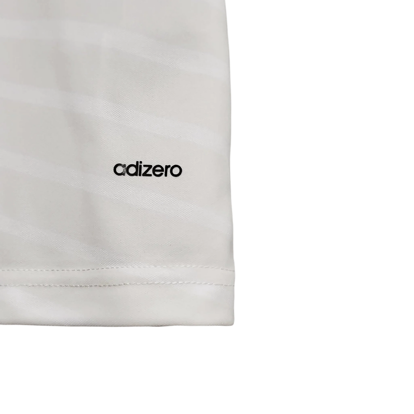 https://cdn.shopify.com/s/files/1/0826/7228/8075/files/20142015-real-madrid-fly-emirates-home-retro-kit-666450.webp?v=1741197448