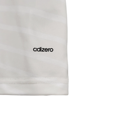 https://cdn.shopify.com/s/files/1/0826/7228/8075/files/20142015-real-madrid-fly-emirates-home-retro-kit-666450.webp?v=1741197448