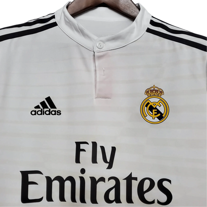 https://cdn.shopify.com/s/files/1/0826/7228/8075/files/20142015-real-madrid-fly-emirates-home-retro-kit-976904.webp?v=1741197450