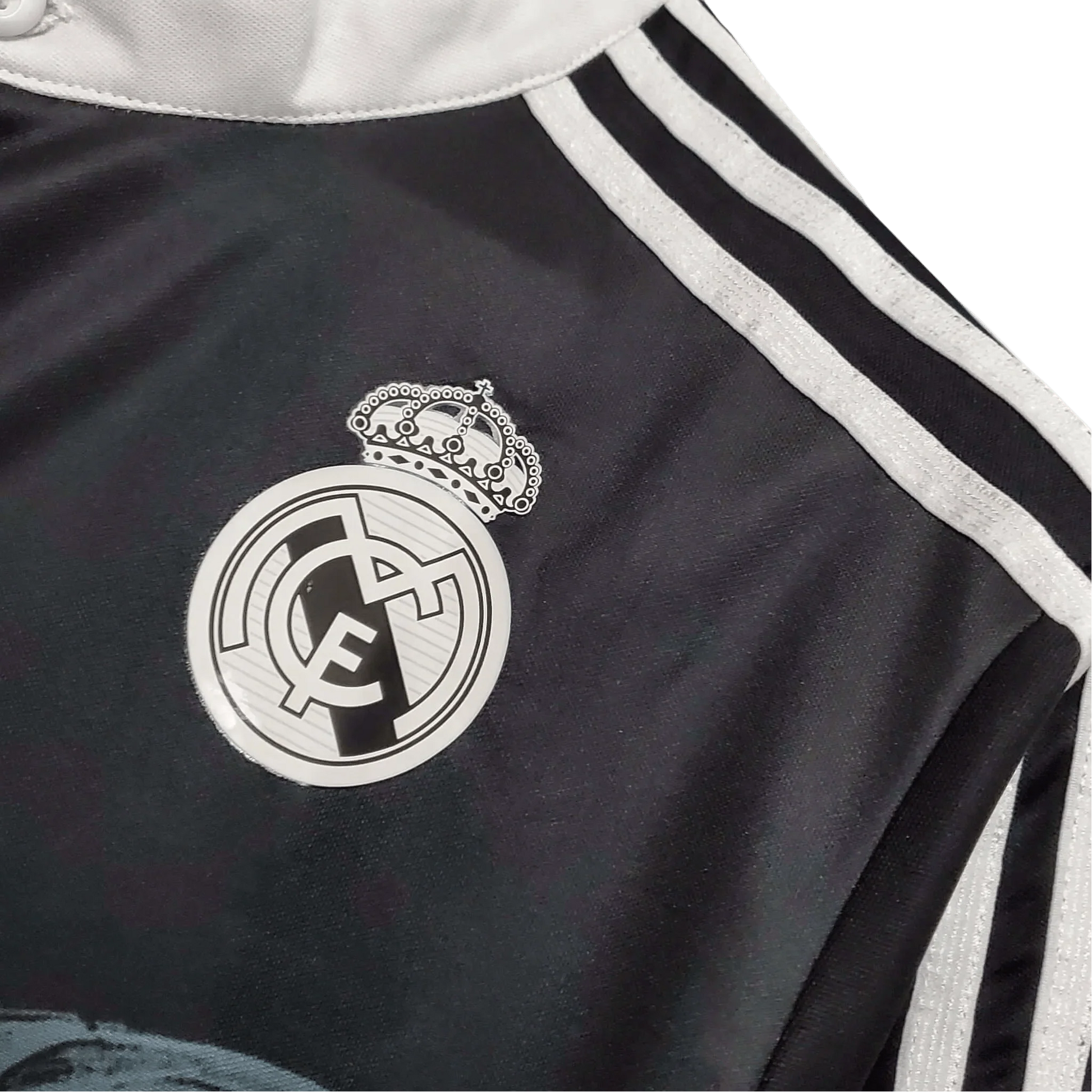 https://cdn.shopify.com/s/files/1/0826/7228/8075/files/20142015-real-madrid-fly-emirates-third-retro-kit-long-sleeves-106045.webp?v=1741197488