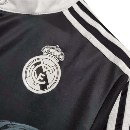 https://cdn.shopify.com/s/files/1/0826/7228/8075/files/20142015-real-madrid-fly-emirates-third-retro-kit-long-sleeves-106045.webp?v=1741197488