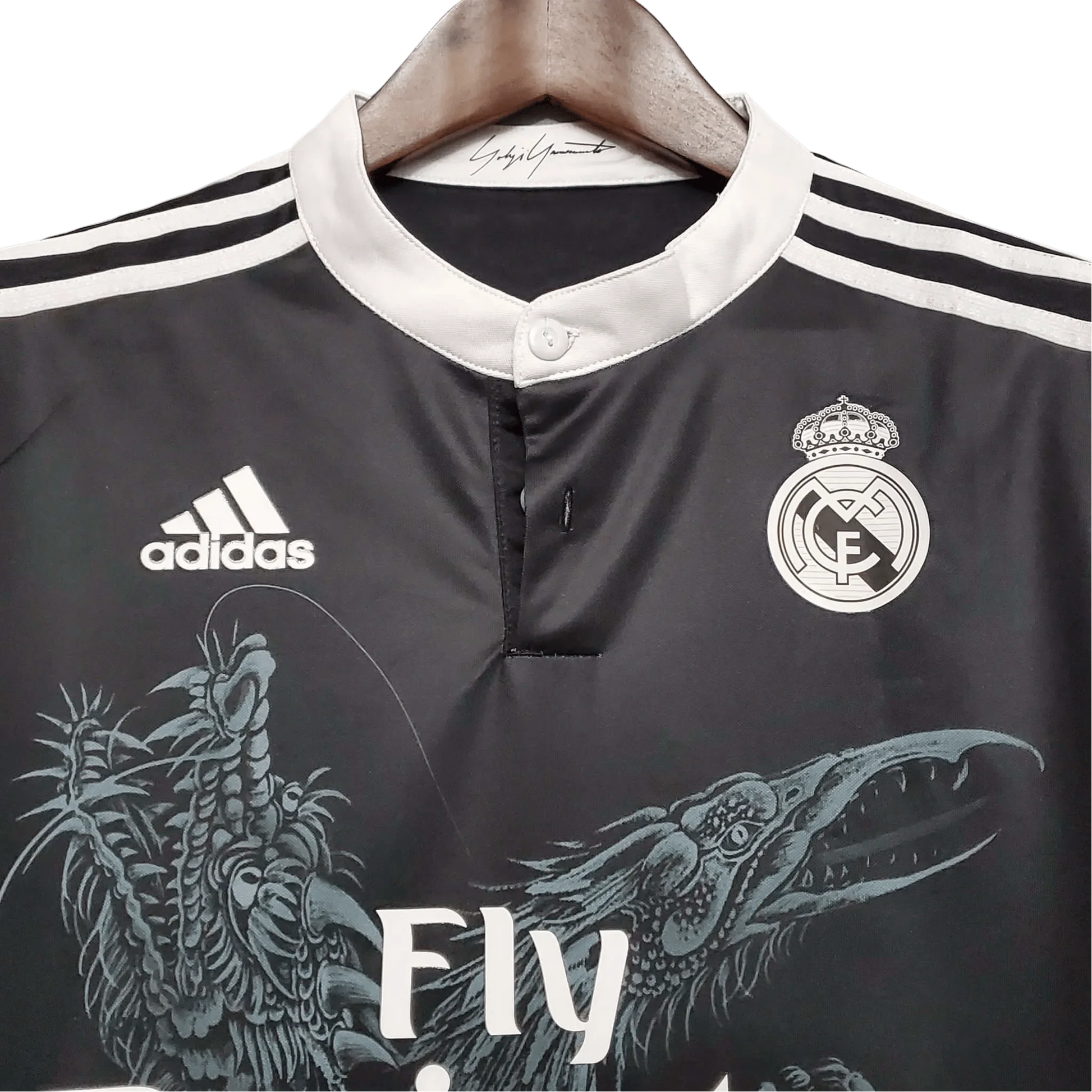 https://cdn.shopify.com/s/files/1/0826/7228/8075/files/20142015-real-madrid-fly-emirates-third-retro-kit-long-sleeves-849424.webp?v=1741197487