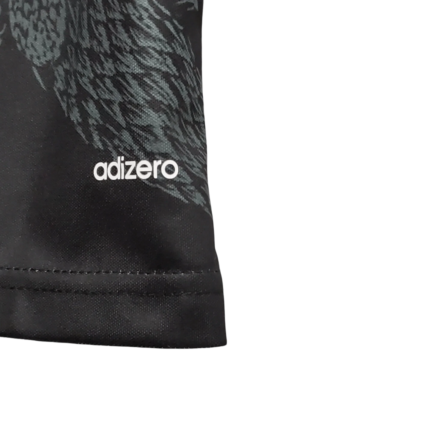 https://cdn.shopify.com/s/files/1/0826/7228/8075/files/20142015-real-madrid-fly-emirates-third-retro-kit-short-sleeves-222135.webp?v=1741197483