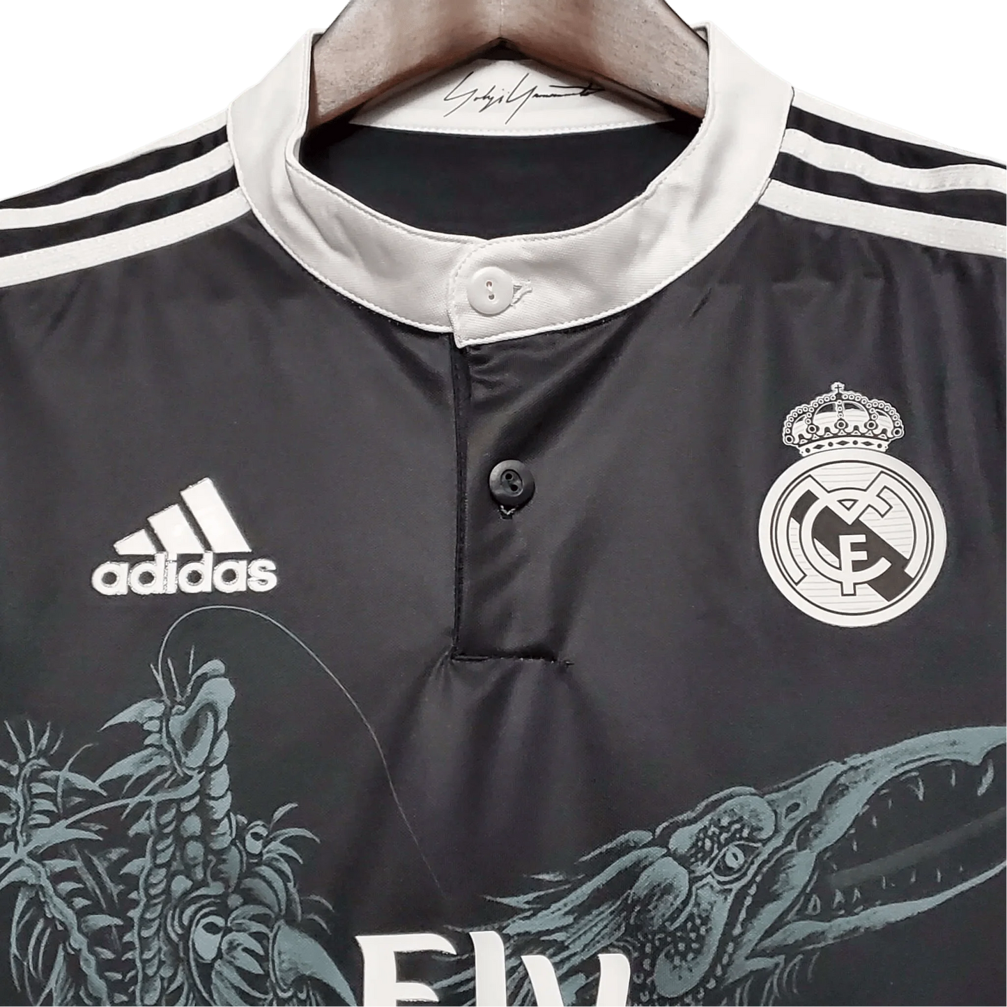 https://cdn.shopify.com/s/files/1/0826/7228/8075/files/20142015-real-madrid-fly-emirates-third-retro-kit-short-sleeves-748147.webp?v=1741197488