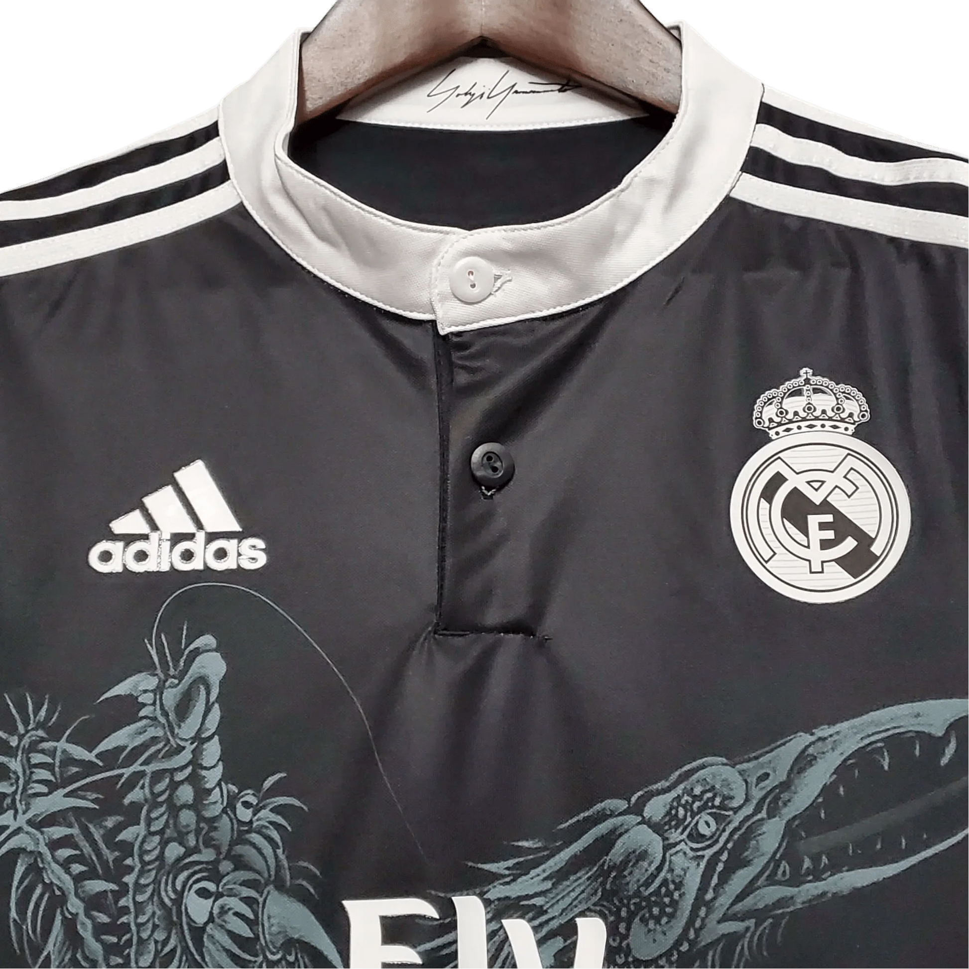https://cdn.shopify.com/s/files/1/0826/7228/8075/files/20142015-real-madrid-fly-emirates-third-retro-kit-short-sleeves-748147.webp?v=1741197488