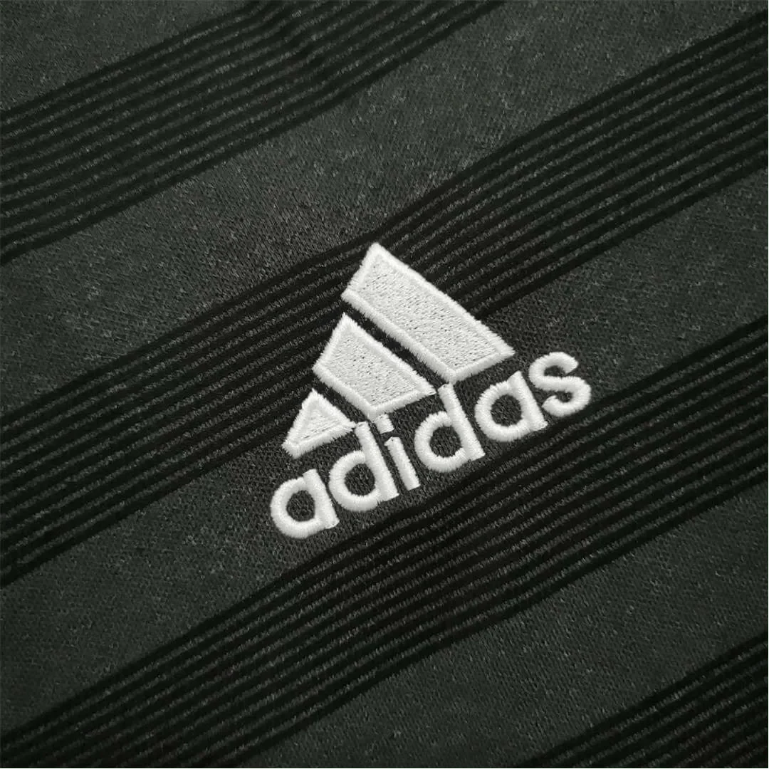 https://cdn.shopify.com/s/files/1/0826/7228/8075/files/2016-germany-away-retro-kit-595520.webp?v=1741197032