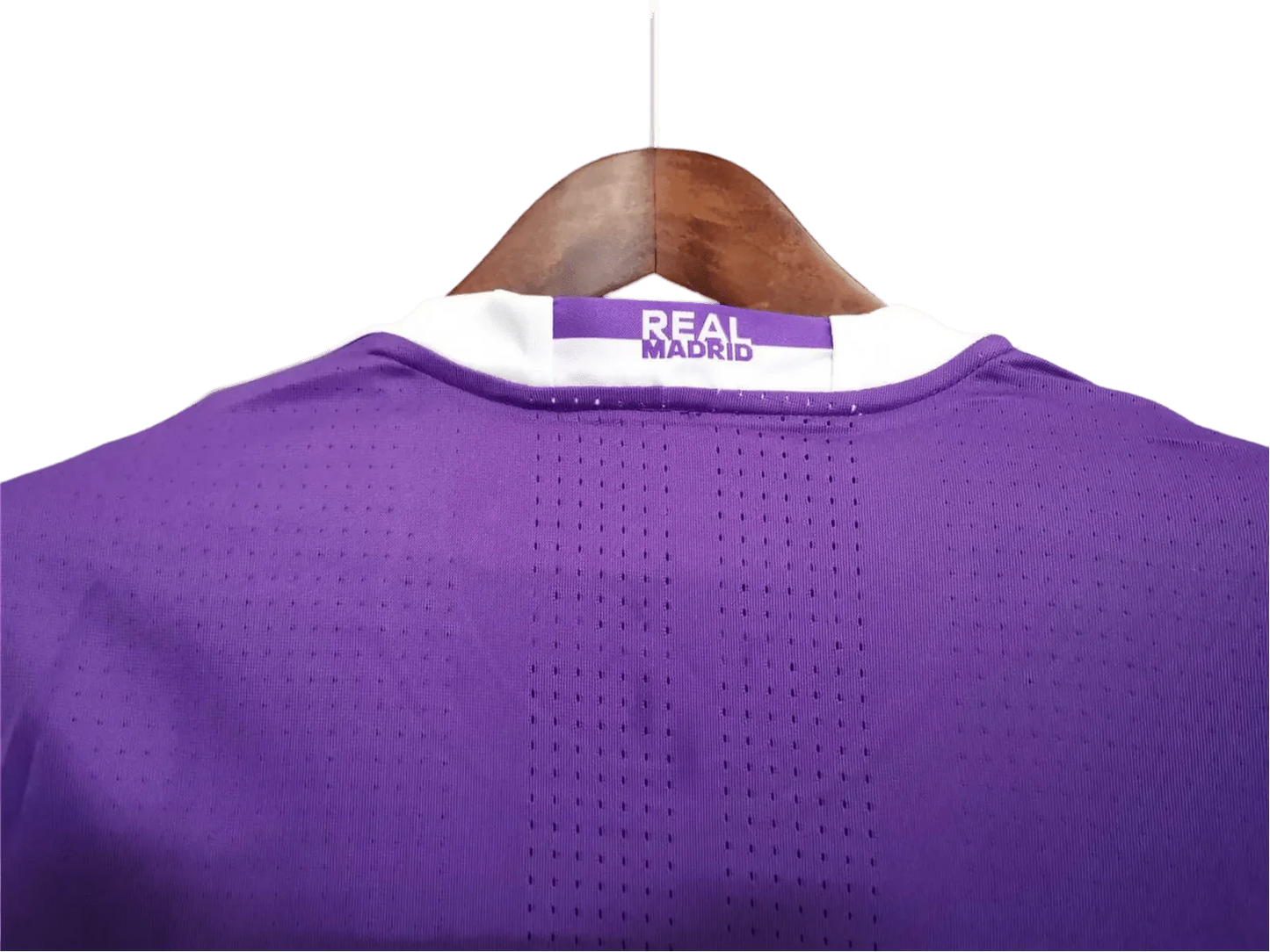https://cdn.shopify.com/s/files/1/0826/7228/8075/files/20162017-real-madrid-fly-emirates-away-purple-retro-kit-445609.webp?v=1741197470