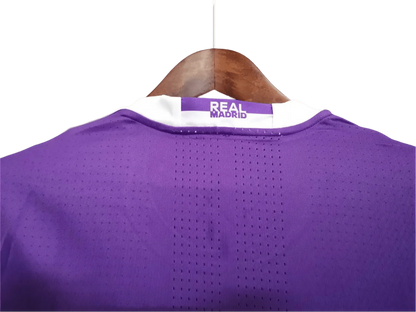 https://cdn.shopify.com/s/files/1/0826/7228/8075/files/20162017-real-madrid-fly-emirates-away-purple-retro-kit-445609.webp?v=1741197470