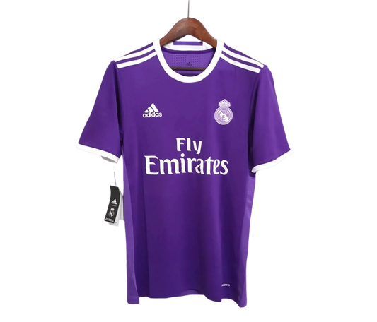 https://cdn.shopify.com/s/files/1/0826/7228/8075/files/20162017-real-madrid-fly-emirates-away-purple-retro-kit-591722.webp?v=1741197470
