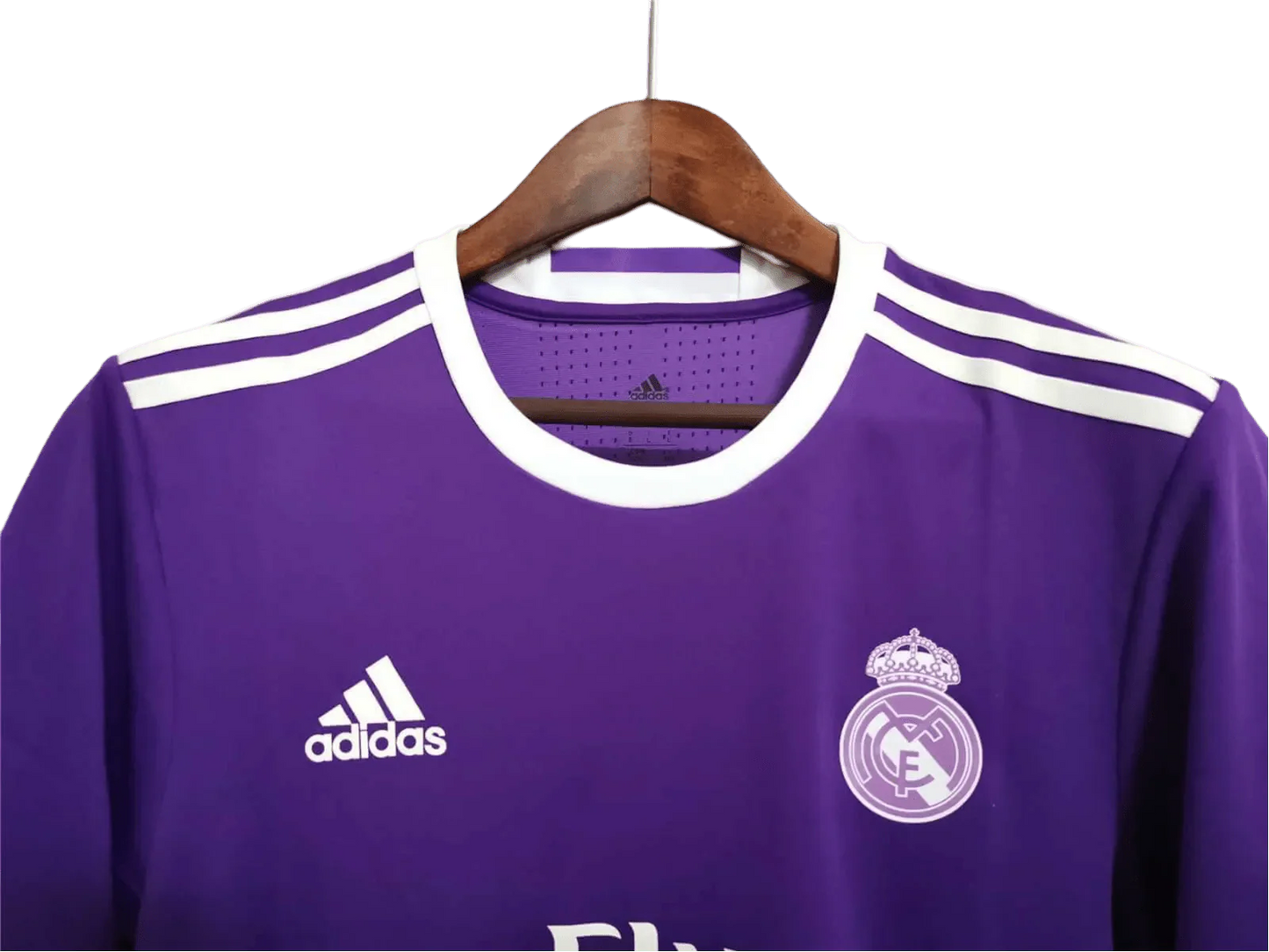 https://cdn.shopify.com/s/files/1/0826/7228/8075/files/20162017-real-madrid-fly-emirates-away-purple-retro-kit-695620.webp?v=1741197471