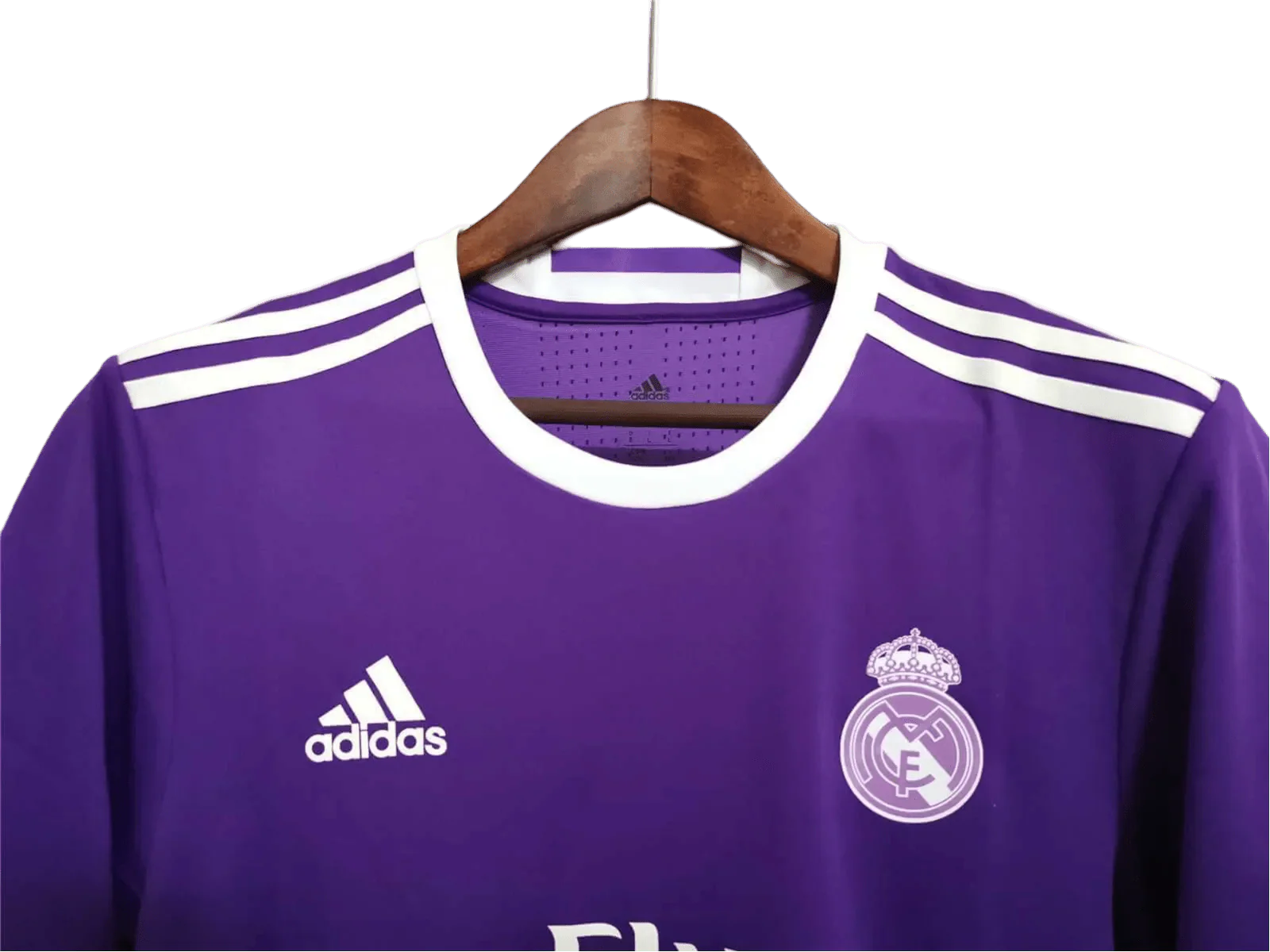 https://cdn.shopify.com/s/files/1/0826/7228/8075/files/20162017-real-madrid-fly-emirates-away-purple-retro-kit-695620.webp?v=1741197471