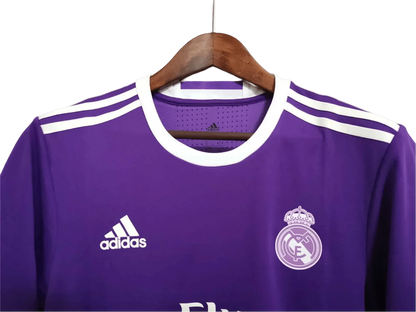 https://cdn.shopify.com/s/files/1/0826/7228/8075/files/20162017-real-madrid-fly-emirates-away-purple-retro-kit-695620.webp?v=1741197471