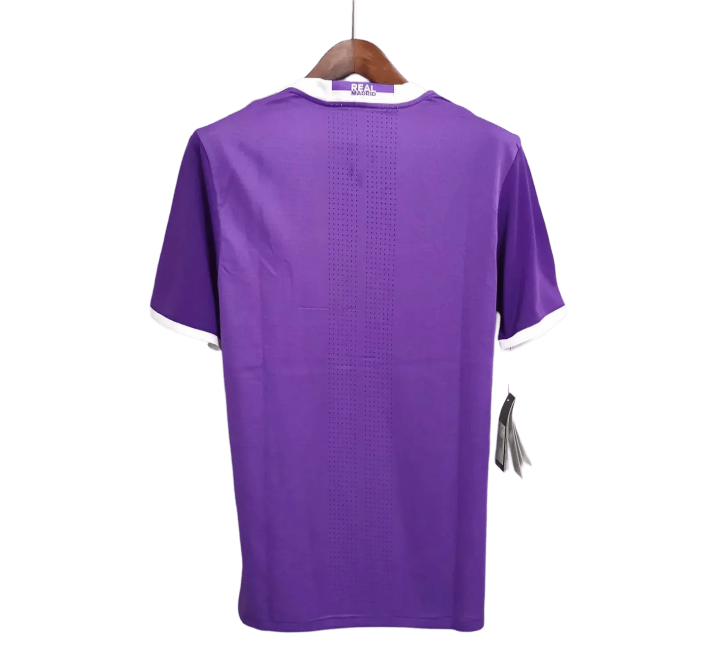 https://cdn.shopify.com/s/files/1/0826/7228/8075/files/20162017-real-madrid-fly-emirates-away-purple-retro-kit-774305.webp?v=1741197472