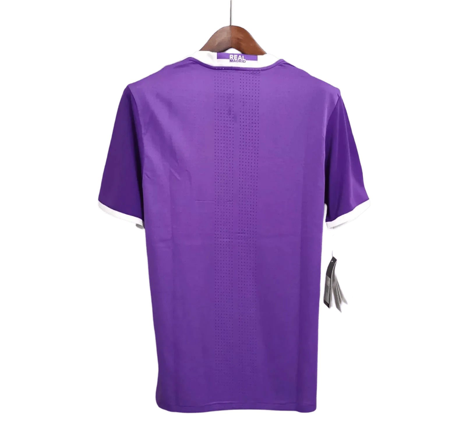 https://cdn.shopify.com/s/files/1/0826/7228/8075/files/20162017-real-madrid-fly-emirates-away-purple-retro-kit-774305.webp?v=1741197472