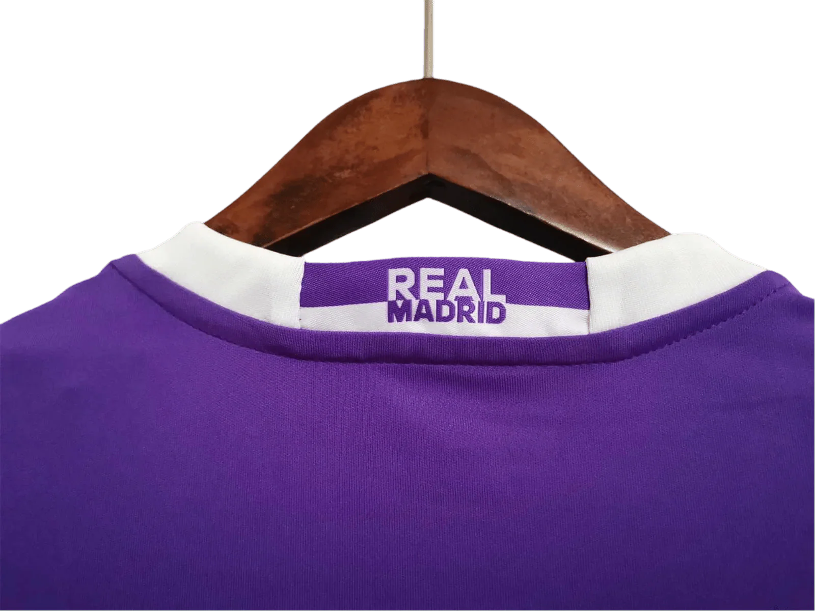 https://cdn.shopify.com/s/files/1/0826/7228/8075/files/20162017-real-madrid-fly-emirates-away-purple-retro-kit-long-sleeves-142725.webp?v=1741197485