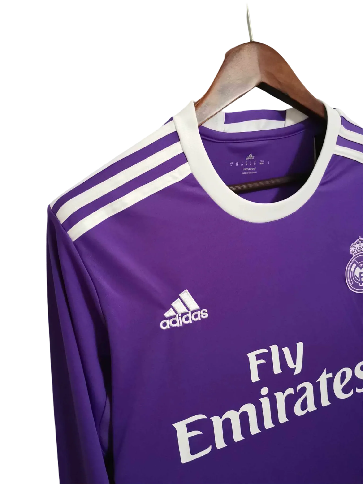 https://cdn.shopify.com/s/files/1/0826/7228/8075/files/20162017-real-madrid-fly-emirates-away-purple-retro-kit-long-sleeves-175815.webp?v=1741197489