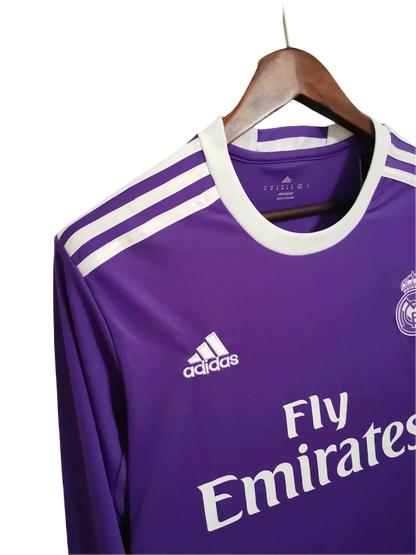 https://cdn.shopify.com/s/files/1/0826/7228/8075/files/20162017-real-madrid-fly-emirates-away-purple-retro-kit-long-sleeves-175815.webp?v=1741197489