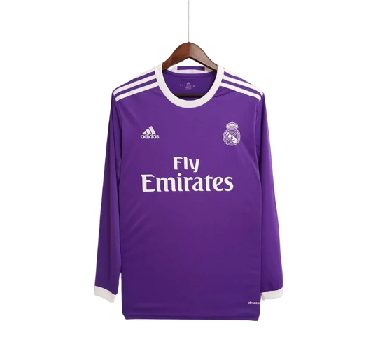 https://cdn.shopify.com/s/files/1/0826/7228/8075/files/20162017-real-madrid-fly-emirates-away-purple-retro-kit-long-sleeves-412990.webp?v=1741197489