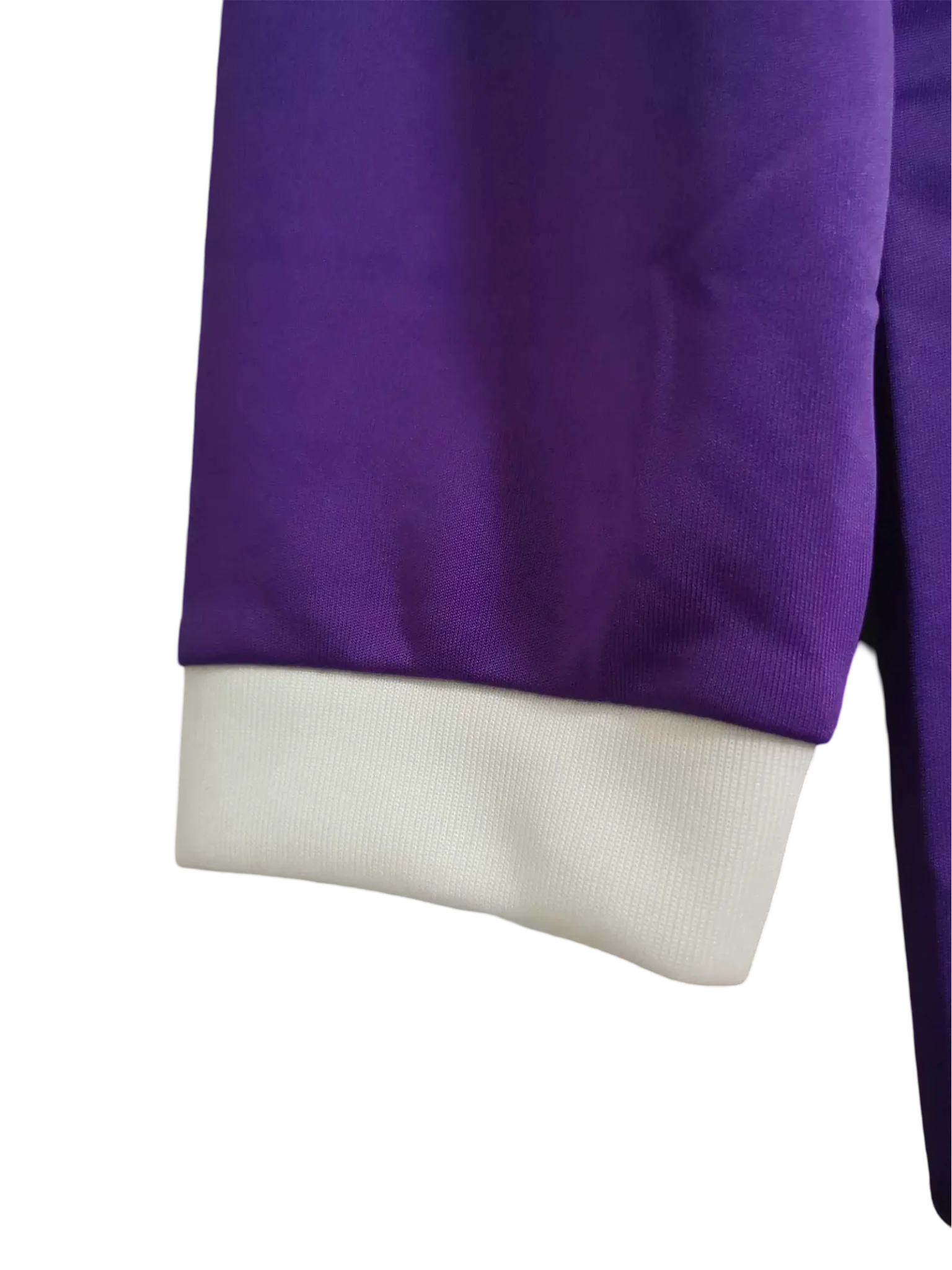 https://cdn.shopify.com/s/files/1/0826/7228/8075/files/20162017-real-madrid-fly-emirates-away-purple-retro-kit-long-sleeves-515200.webp?v=1741197487