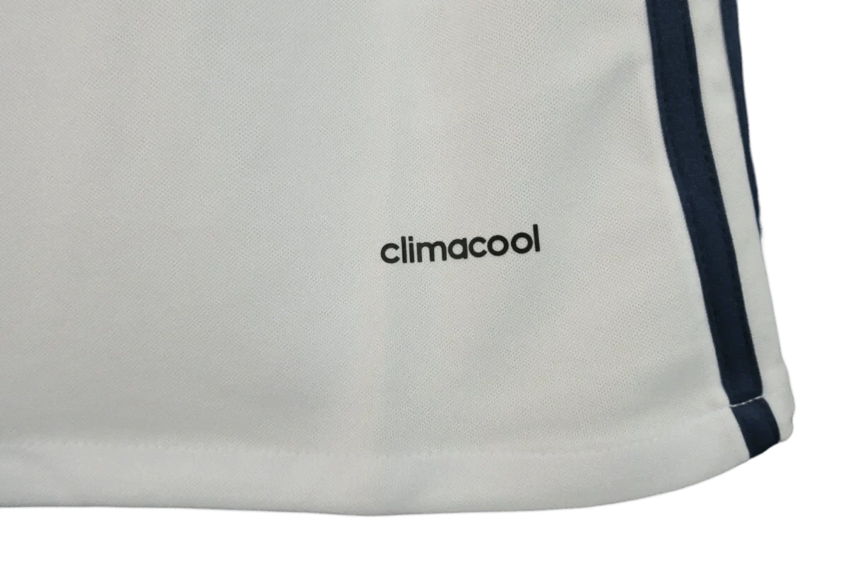https://cdn.shopify.com/s/files/1/0826/7228/8075/files/20162017-real-madrid-fly-emirates-home-retro-kit-700987.webp?v=1741197451