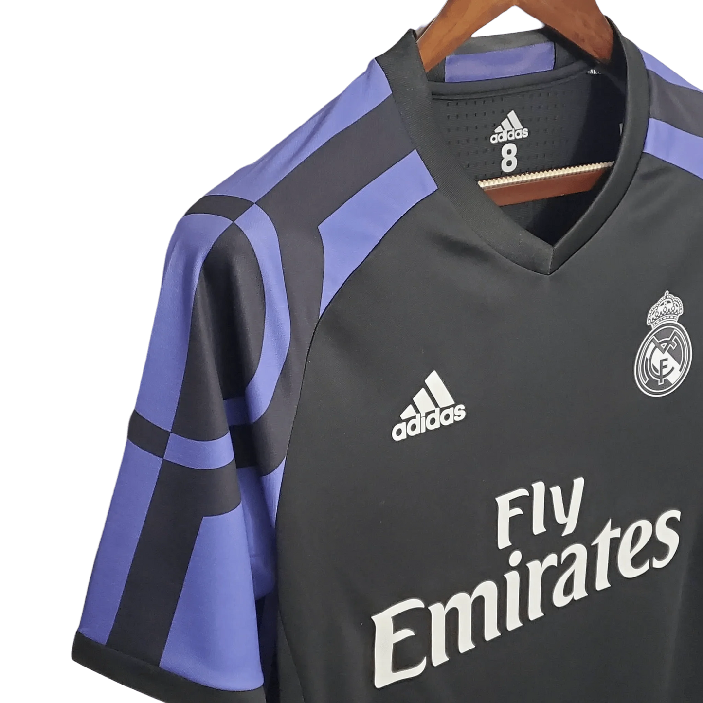 https://cdn.shopify.com/s/files/1/0826/7228/8075/files/20162017-real-madrid-fly-emirates-third-retro-kit-657353.webp?v=1741197449