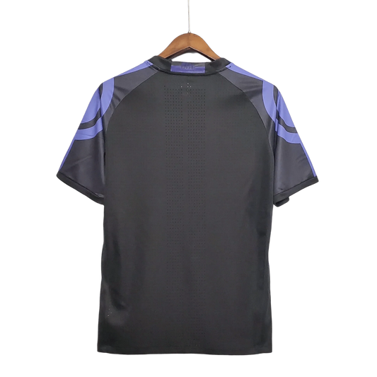 https://cdn.shopify.com/s/files/1/0826/7228/8075/files/20162017-real-madrid-fly-emirates-third-retro-kit-691986.webp?v=1741197448