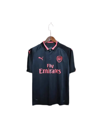 https://cdn.shopify.com/s/files/1/0826/7228/8075/files/20172018-arsenal-fly-emirates-third-retro-kit-classickits433-578862.webp?v=1741198350