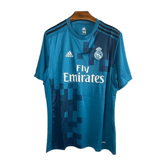 https://cdn.shopify.com/s/files/1/0826/7228/8075/files/20172018-real-madrid-fly-emirates-away-retro-kit-classickits433-857327.webp?v=1741198520