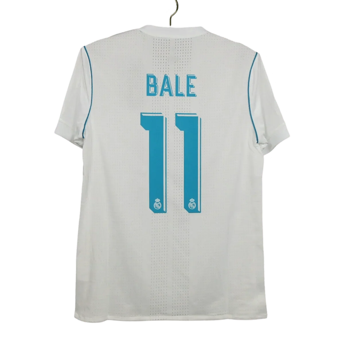 https://cdn.shopify.com/s/files/1/0826/7228/8075/files/20172018-real-madrid-fly-emirates-home-retro-kit-207180.webp?v=1741197466