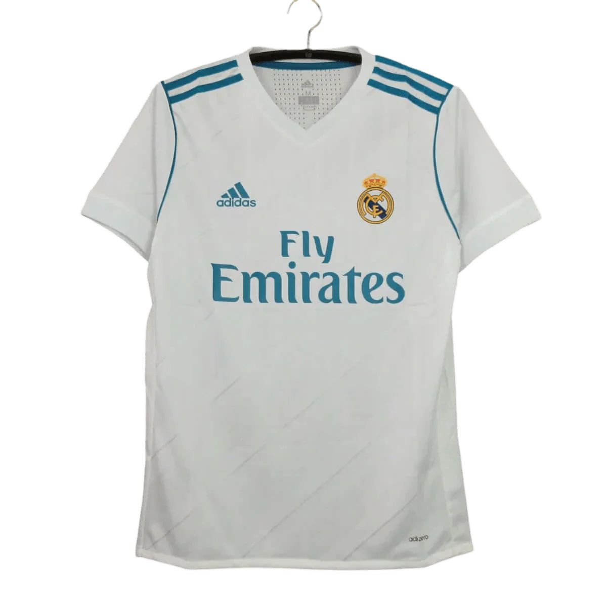 https://cdn.shopify.com/s/files/1/0826/7228/8075/files/20172018-real-madrid-fly-emirates-home-retro-kit-740369.webp?v=1741197468