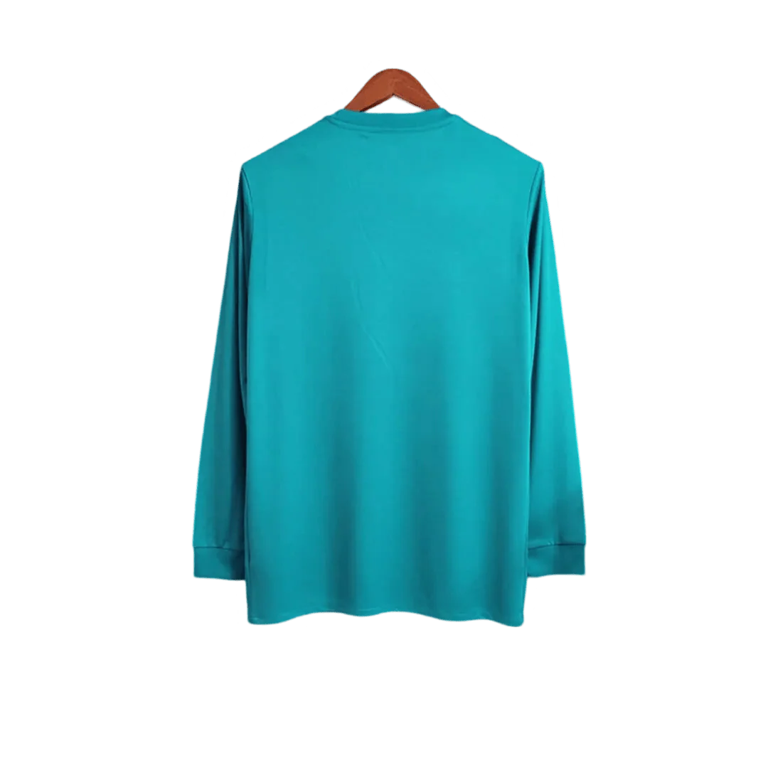 https://cdn.shopify.com/s/files/1/0826/7228/8075/files/20172018-real-madrid-fly-emirates-third-away-retro-kit-long-sleeves-660406.webp?v=1741197437