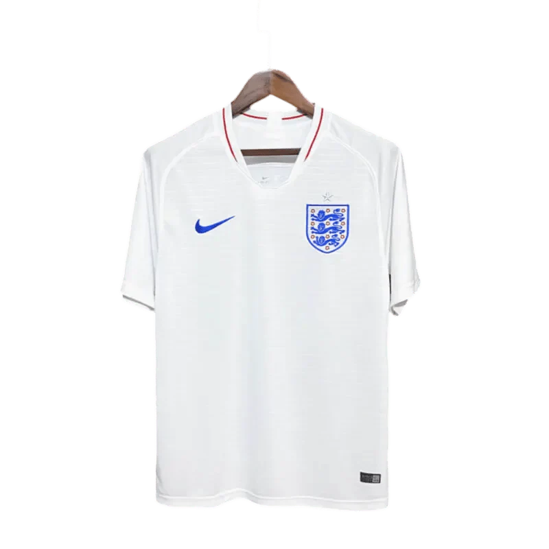 https://cdn.shopify.com/s/files/1/0826/7228/8075/files/2018-england-home-retro-kit-190368.webp?v=1741196963