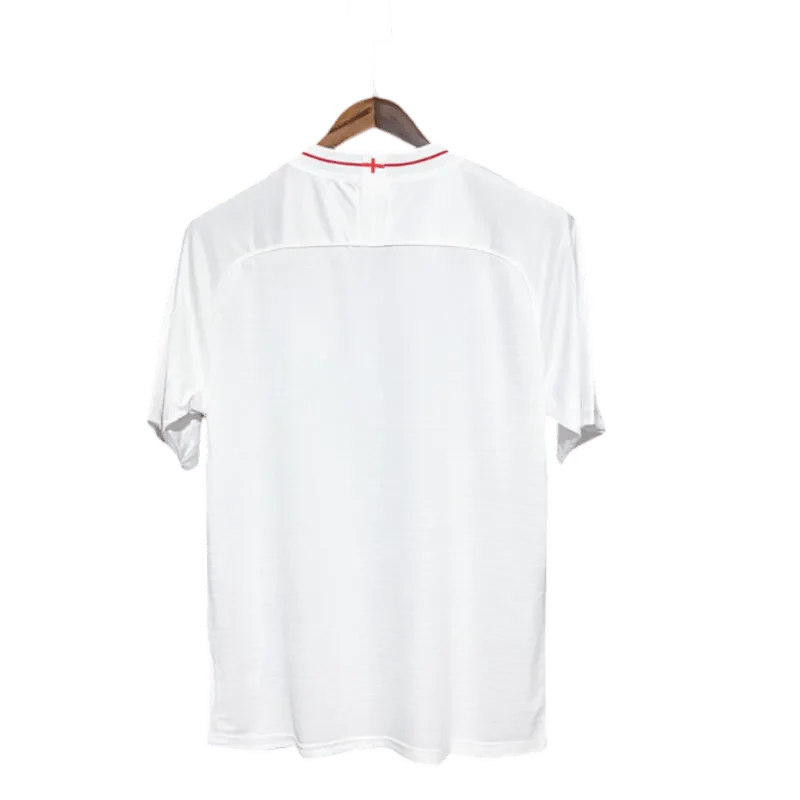 https://cdn.shopify.com/s/files/1/0826/7228/8075/files/2018-england-home-retro-kit-676556.webp?v=1741196964