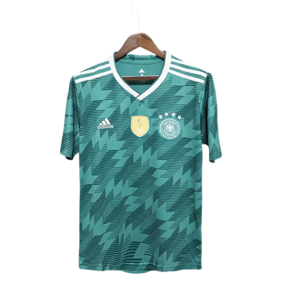https://cdn.shopify.com/s/files/1/0826/7228/8075/files/2018-germany-away-retro-kit-342228.webp?v=1741197049