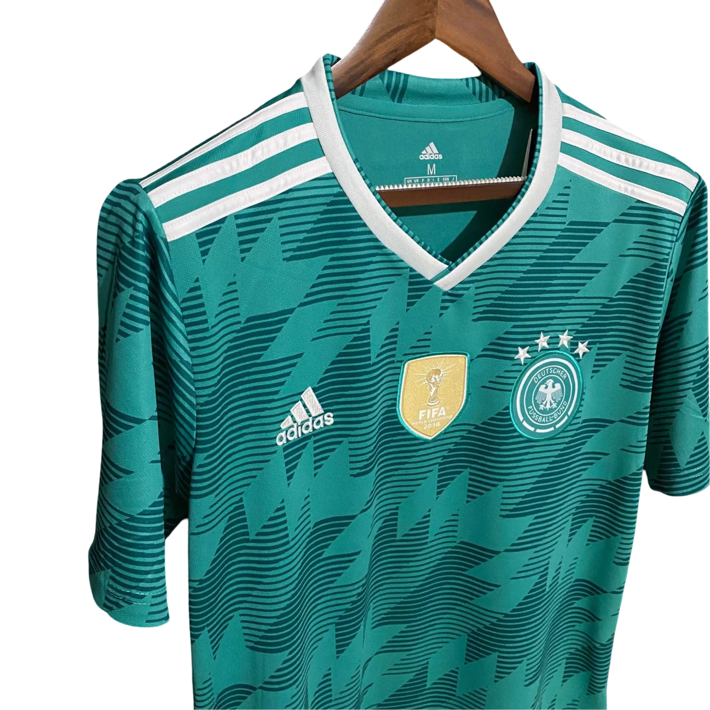 https://cdn.shopify.com/s/files/1/0826/7228/8075/files/2018-germany-away-retro-kit-985914.webp?v=1741197050