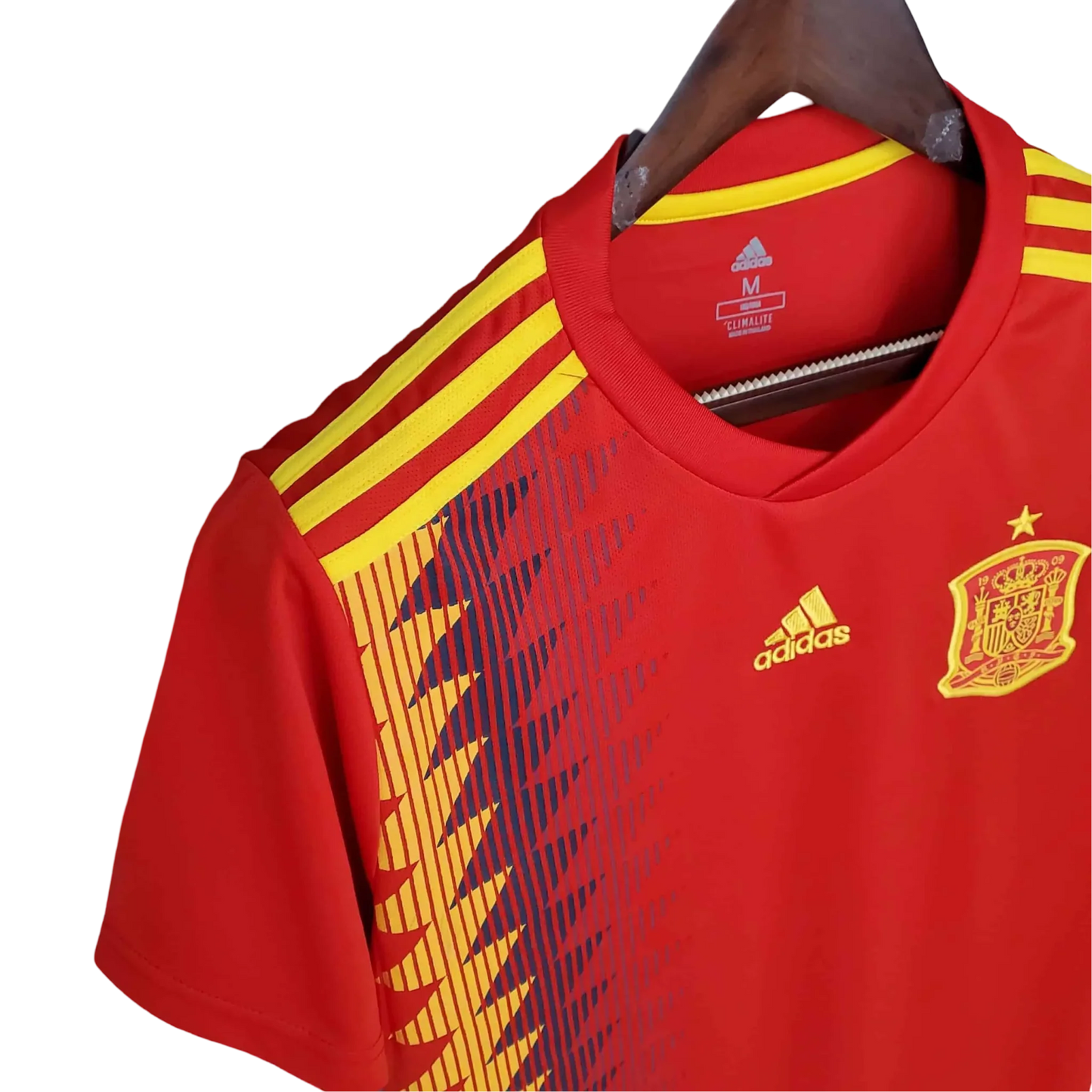 https://cdn.shopify.com/s/files/1/0826/7228/8075/files/2018-spain-home-retro-kit-530615.webp?v=1741197185