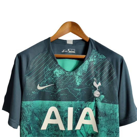 https://cdn.shopify.com/s/files/1/0826/7228/8075/files/20182019-tottenham-hotspur-aia-green-third-retro-kit-classickits433-338318.webp?v=1741199153