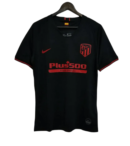 https://cdn.shopify.com/s/files/1/0826/7228/8075/files/20192020-atletico-madrid-plus500-away-black-retro-kit-classickits433-807607.webp?v=1741198272