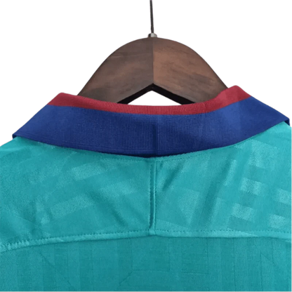 https://cdn.shopify.com/s/files/1/0826/7228/8075/files/20192020-fc-barcelona-rakuten-third-away-retro-kit-classickits433-638742.webp?v=1741197552
