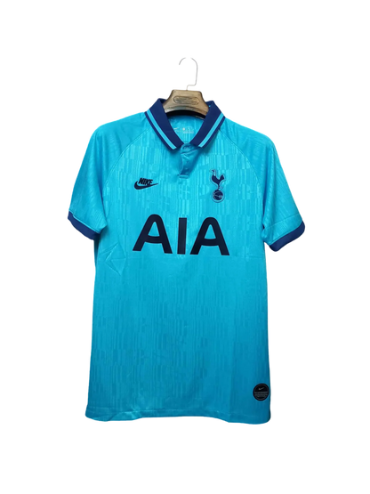 https://cdn.shopify.com/s/files/1/0826/7228/8075/files/20192020-tottenham-hotspur-aia-blue-third-retro-kit-classickits433-413493.webp?v=1741198019