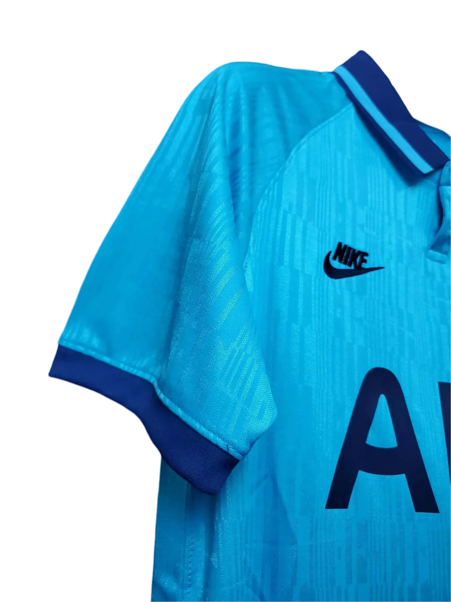 https://cdn.shopify.com/s/files/1/0826/7228/8075/files/20192020-tottenham-hotspur-aia-blue-third-retro-kit-classickits433-555156.webp?v=1741198019