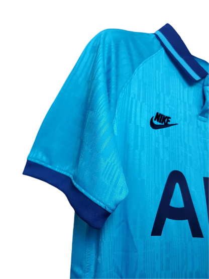 https://cdn.shopify.com/s/files/1/0826/7228/8075/files/20192020-tottenham-hotspur-aia-blue-third-retro-kit-classickits433-555156.webp?v=1741198019