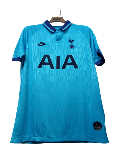 https://cdn.shopify.com/s/files/1/0826/7228/8075/files/20192020-tottenham-hotspur-aia-blue-third-retro-kit-classickits433-841031.webp?v=1741198021
