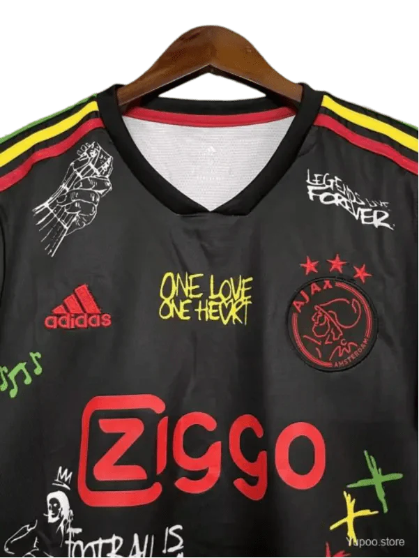 https://cdn.shopify.com/s/files/1/0826/7228/8075/files/20212022-ajax-third-bob-marley-kit-special-edition-fan-version-classickits433-843466.webp?v=1741198450
