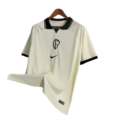 https://cdn.shopify.com/s/files/1/0826/7228/8075/files/20232024-corinthians-beige-kit-special-edition-fan-version-jersey-435993.webp?v=1741198455