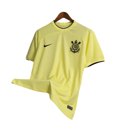 https://cdn.shopify.com/s/files/1/0826/7228/8075/files/20232024-corinthians-yellow-kit-special-edition-fan-version-jersey-478833.webp?v=1741198472