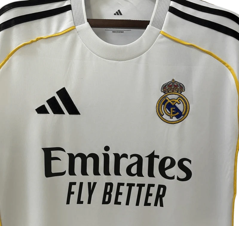 https://cdn.shopify.com/s/files/1/0826/7228/8075/files/20252026-real-madrid-emirates-fly-home-jersey-163845.webp?v=1749605801